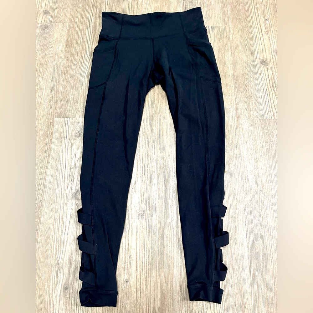 Athleta leggings with cross cross ankle cut Small